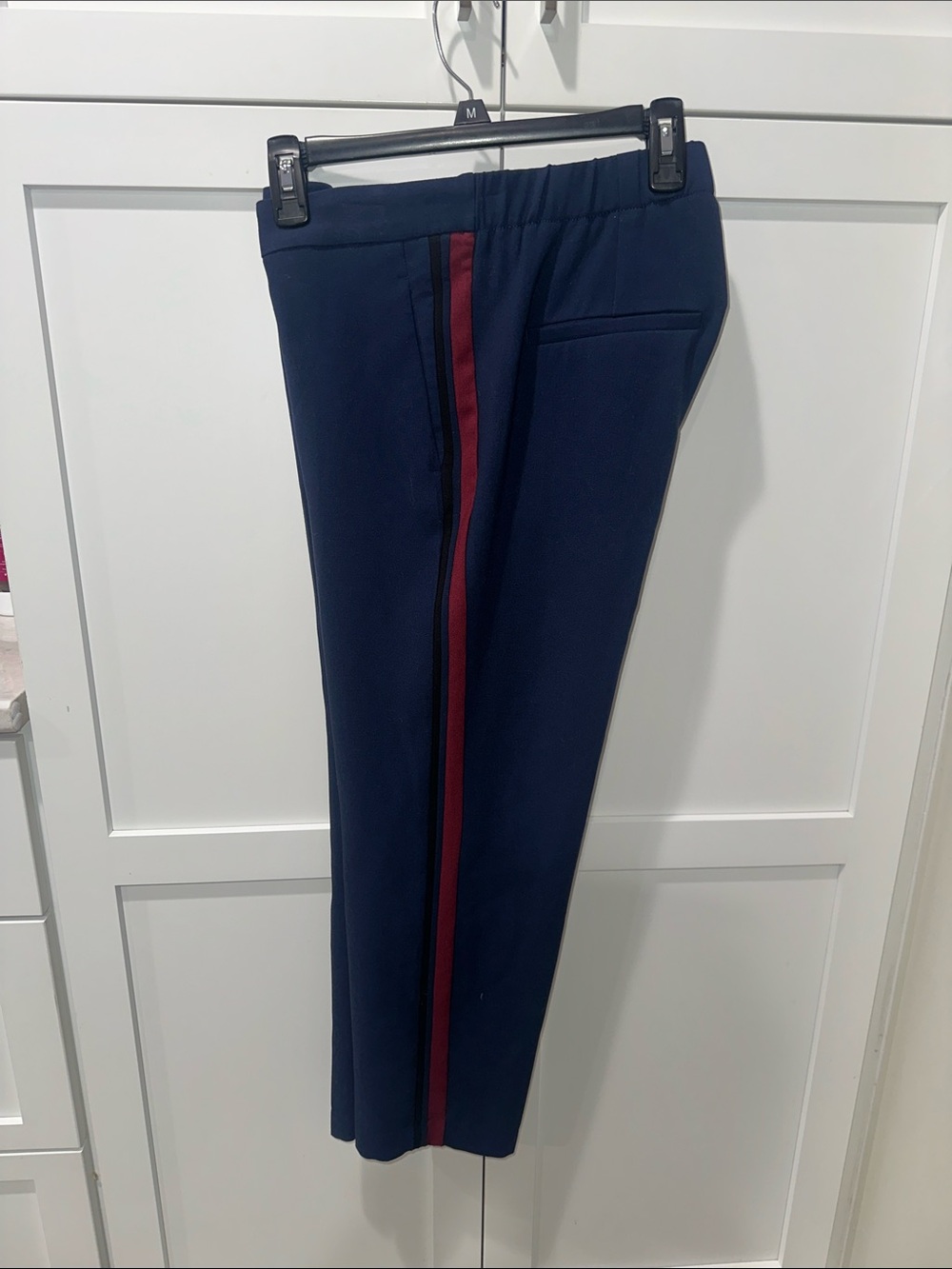 Navy slacks,pants with maroon,black, navy stripe down the side. Good work pants